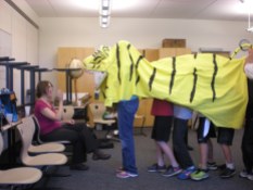 Mr. Kawaragi allows the students to try on his Tiger costume!